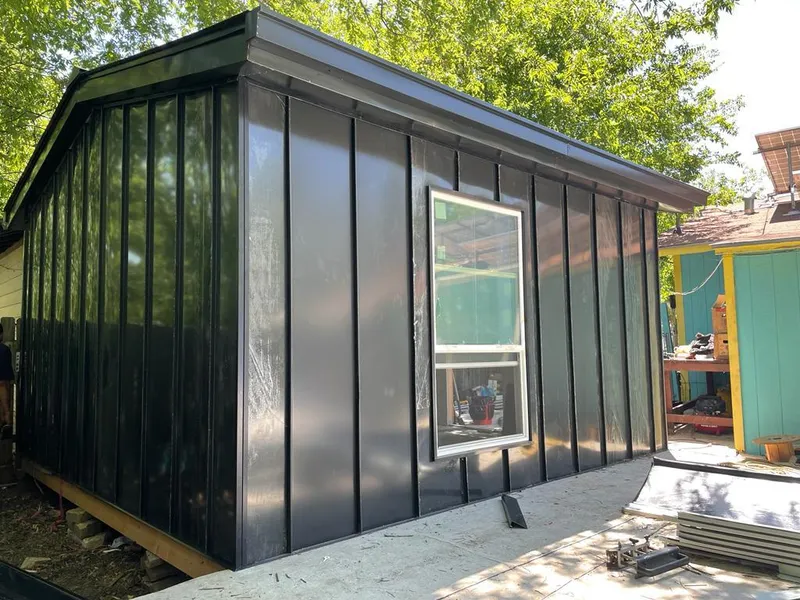 Black standing seam metal wall panels for Metal Roof Installation in Upper Milford