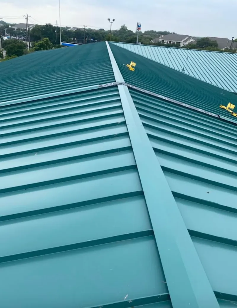 Green commercial metal roof ridge and valley for Metal Roof Repair in Upper Milford